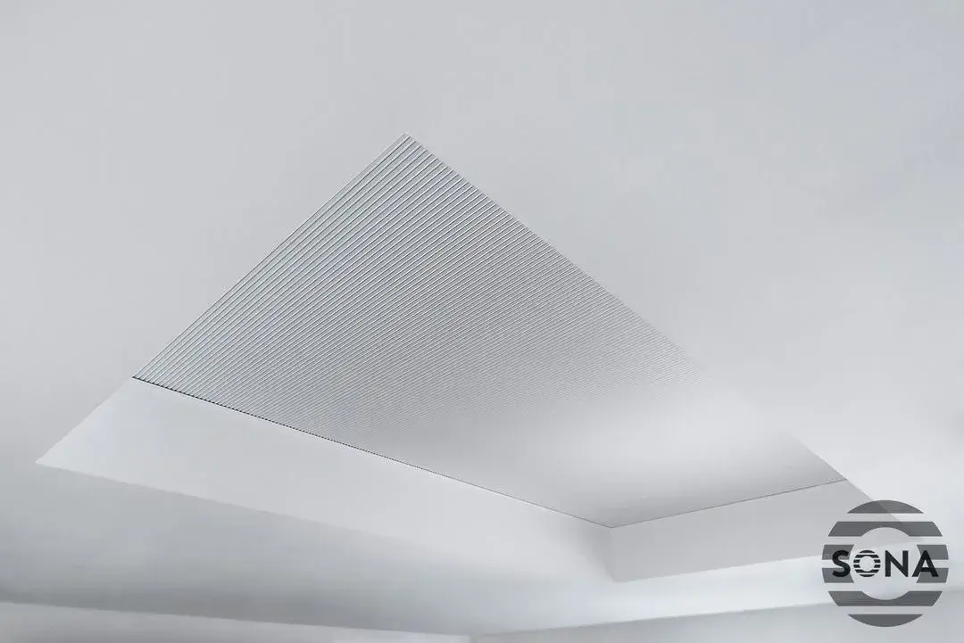 a fully closed electric lantern blind showing the full fabric.