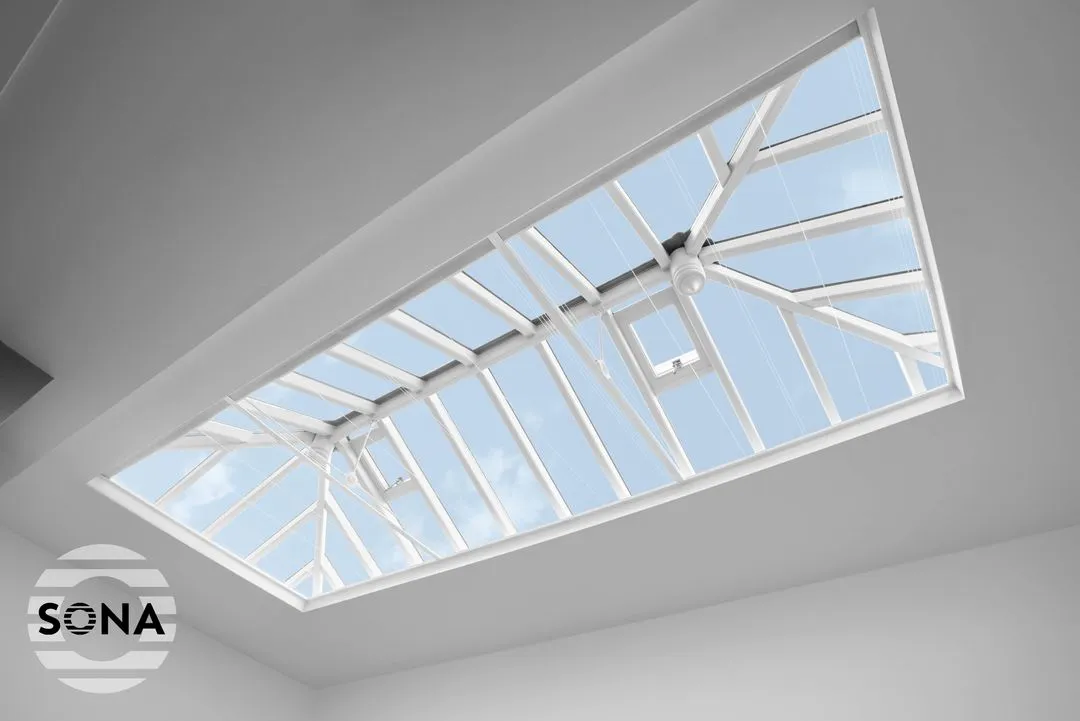 open electric lantern blind on a pitched celing window.